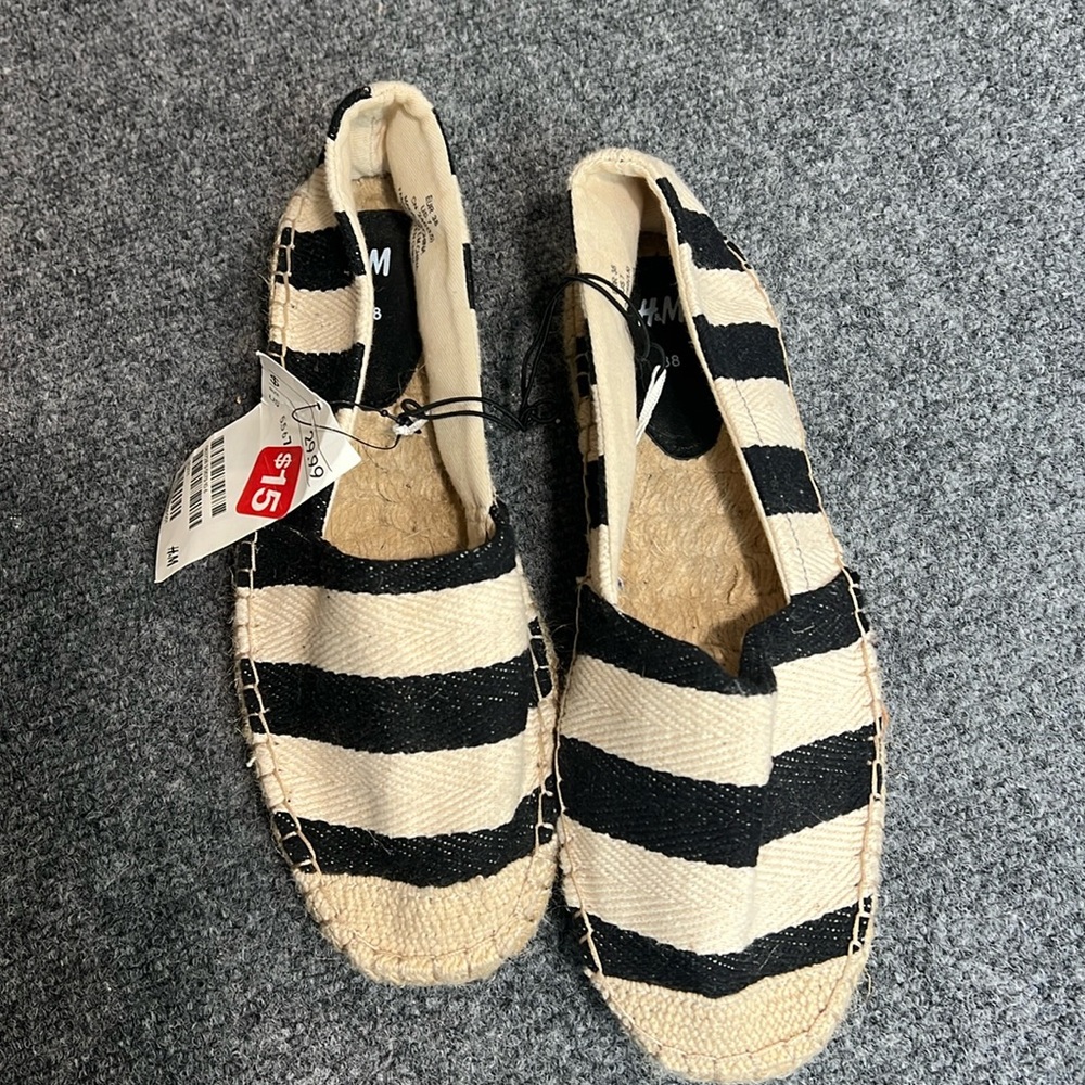 H&M slip on shoes size 7 never worn with tags.